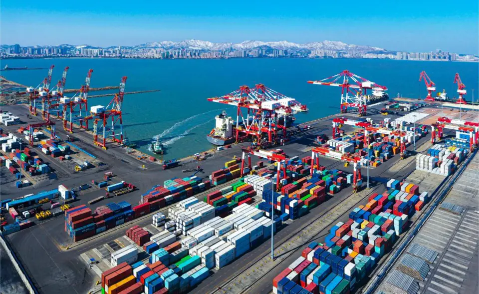 Photo taken on March 3, 2021 shows a container terminal of Weihai Port under the management of Shandong Port Group Co., Ltd. (Photo by Zhu Chunxiao/People's Daily Online)