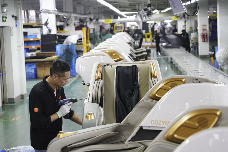 A worker makes massage equipment to be exported to countries along the Belt and Road at a factory in Pingyang county, Wenzhou, east China’s Zhejiang province, May 19, 2021. (Photo by Su Qiaojiang/People’s Daily Online)