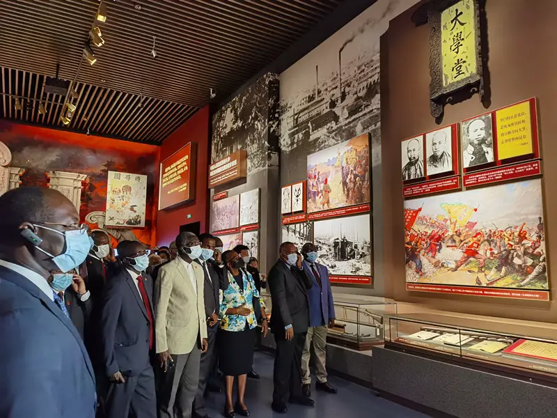 Over 100 diplomatic envoys of foreign countries and representatives of international organizations to China visit an exhibition on the history of the Communist Party of China (CPC) at the Museum of the CPC in Beijing, June 24. (Photo by Zhang Bolan/People’s Daily)