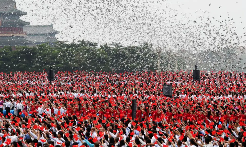 Over 100,000 doves symbolizing peace are released over the Tian’anmen square at a ceremony in celebration of the 100th anniversary of the founding of the Communist Party of China (CPC), July 1. (Photo by Lei Sheng/People’s Daily Online)