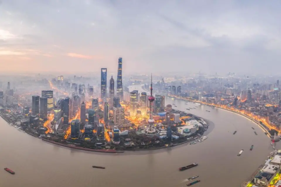 Photo taken on Dec. 27, 2020 shows a magnificent view of Lujiazui, financial center of east China’s Shanghai. (Photo by Ding Junhao/People’s Daily Online)