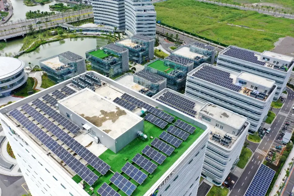Aerial photo taken on Sept. 7, 2021 shows distributed photovoltaic panels installed on the rooftops of CHINT IoT and Sensors Industrial Park in Yueqing, Wenzhou city, east China’s Zhejiang province. (Photo by Cai Kuanyuan/People’s Daily Online)