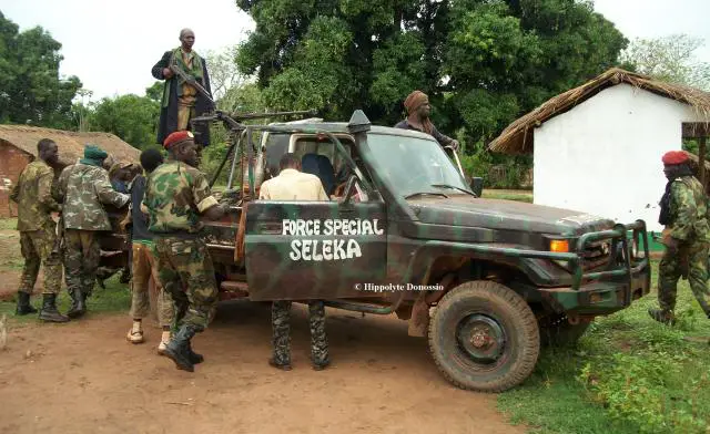 Des combattants autoproclamés "Forces spéciales" de la Séléka, ex-rébellion. Centrafrique. Crédit photo : Hippolyte Donossio