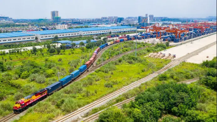 Photo taken on July 12, 2021 shows a China-Europe freight train fully loaded with containers leaving Chengdu International Railway Port in Chengdu, capital of southwest China’s Sichuan province, for Slawkow, Poland. (Photo by Bai Guibin/People’s Daily Online)