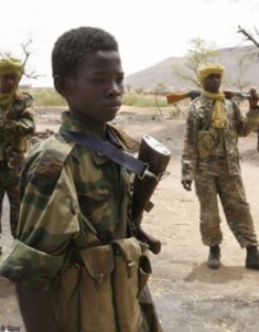 Un enfant soldat. Crédit photo : Sources