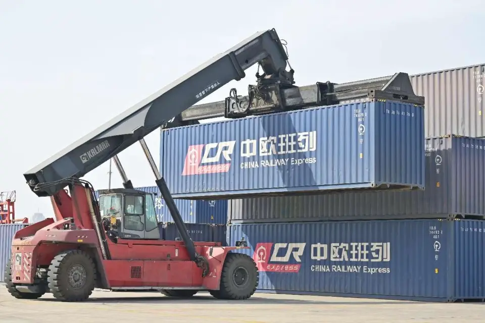 Containers for the China-Europe freight service are being piled at a container terminal in Zhengzhou, central China’s Henan province, March 2, 2022. (Photo by Wang Wei/People’s Daily Online)