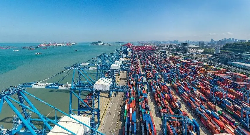 Photo taken on May 17, 2022 shows the busy Mawan Port in Shenzhen, south China’s Guangdong province, the first 5G-empowered green and low-carbon smart port in the Guangdong-Hong Kong-Macao Greater Bay Area. (Photo by Wang Meiyan/People’s Daily Online)