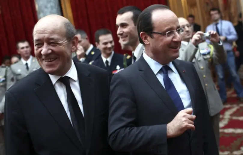 Jean-Yves Le Drian (gauche) et François Hollande (droite). Photo : Reuters