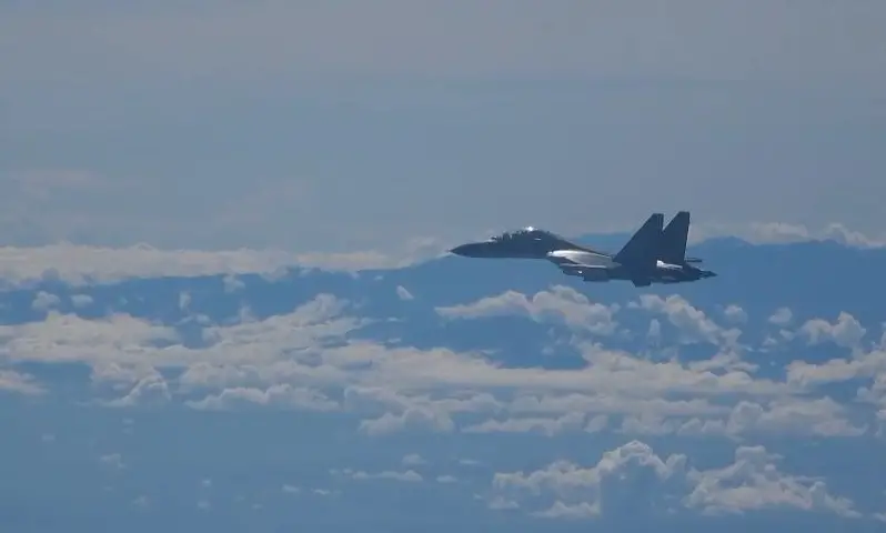A video screenshot shows a warplane conducting operations during exercises and training of the air force corps of the Eastern Theater Command of the Chinese People's Liberation Army (PLA) around the Taiwan Island, Aug. 5, 2022. The Eastern Theater Command on Friday continued joint combat exercises and training in the waters and airspace around the Taiwan Island.