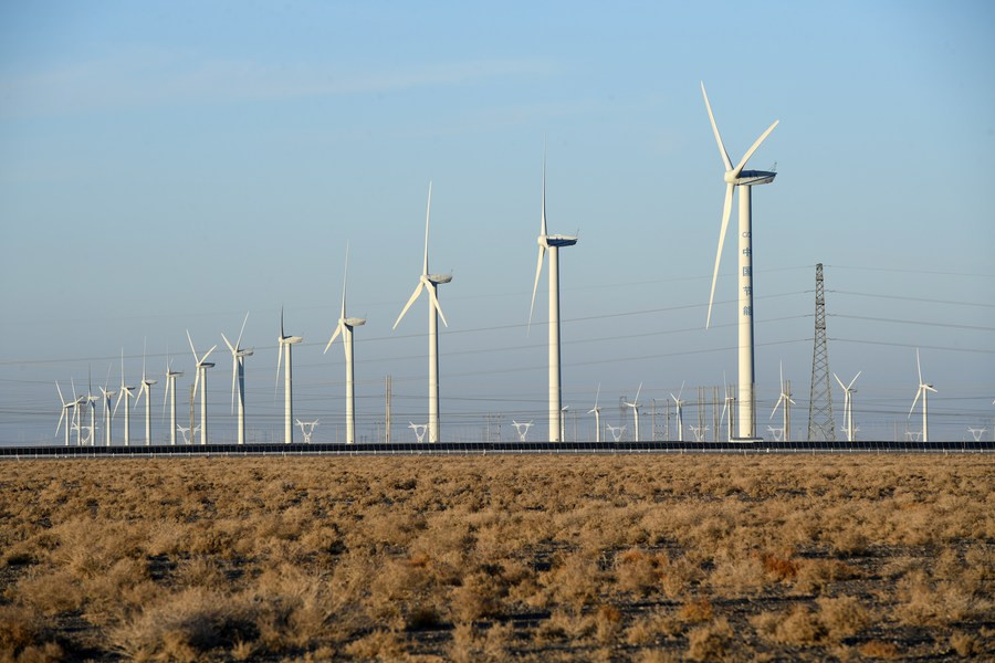 Photo taken on Dec. 8, 2021 shows wind turbines at Changma wind farm in Yumen City, northwest China's Gansu Province. (Xinhua/Fan Peishen)