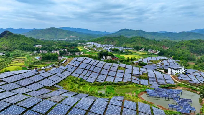 Photo taken on Sept. 12, 2022 shows solar panels installed in Huangsha village, Zhuangkou township, Huichang county, Ganzhou, east China's Jiangxi province. (Photo by Zhu Haipeng/People's Daily Online)