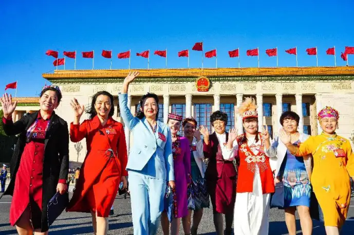 Deputies to the 20th National Congress of the Communist Party of China pose for a picture in front of the Great Hall of the People in Beijing after the congress concluded, Oct. 22, 2022. (Photo by He Yong/People's Daily)