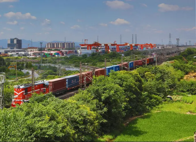 A freight train carrying photovoltaic (PV) parts for a PV project in central Myanmar carried out by the Power Construction Corporation of China departs from Yiwu, east China's Zhejiang province, July 7, 2022. (Photo by Gong Xianming/People's Daily Online)