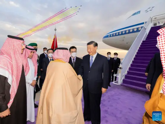 Chinese President Xi Jinping is warmly greeted upon his arrival by Governor of Riyadh Province Prince Faisal bin Bandar Al Saud, Foreign Minister Prince Faisal bin Farhan Al Saud, Minister Yasir Al-Rumayyan who works on China affairs and other key members of the royal family and senior officials of the government at the King Khalid International Airport in Riyadh, Saudi Arabia, Dec. 7, 2022.