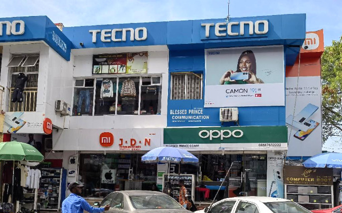 Logos of Chinese mobile phone brands are seen everywhere at Banex Plaza, a popular shopping center in Abuja, capital of Nigeria.(Photo by Jiang Xuan/People's Daily)