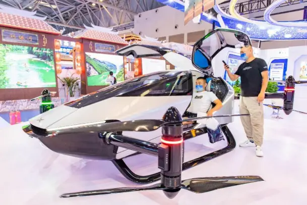 A flying car is exhibited at the fourth Western China International Fair for Investment and Trade held in southwest China's Chongqing municipality, July 22, 2022. (Photo by Sun Kaifang/People's Daily Online)