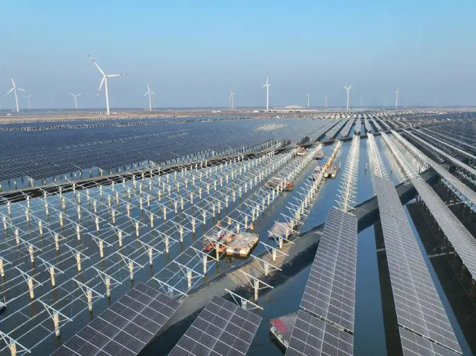 Photovoltaic panels are installed in a fish farm in Rudong county, Nantong, east China's Jiangsu province, Feb. 20, 2023. (Photo by Xu Congjun/People's Daily Online)