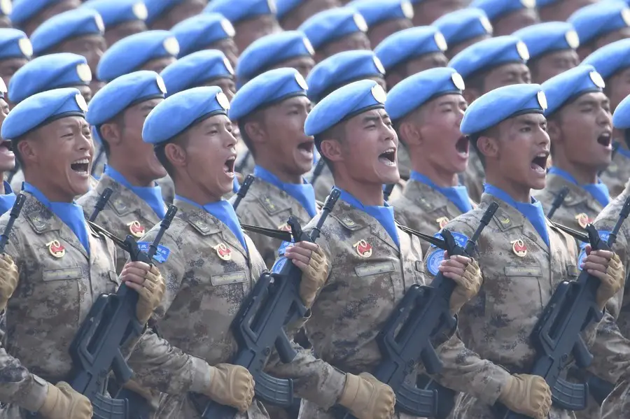 A formation of Chinese peacekeepers take part in a grand military parade celebrating the 70th founding anniversary of the People's Republic of China in Beijing, capital of China, Oct. 1, 2019. (Xinhua/Liu Dawei)