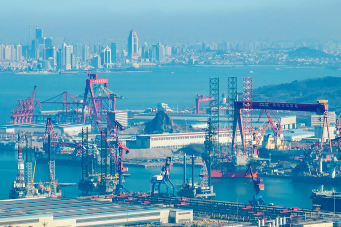Photo taken on Feb. 26, 2023 shows a shipbuilding base in Xihai'an (West Coast) New Area of Qingdao, east China's Shandong province. (Photo by Han Jiajun/People's Daily Online)