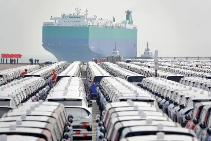 Vehicles are about to be loaded onto a ship for exportation at the Yantai Port, east China's Shandong province, May 9, 2023. (Photo by Tang Ke/People's Daily Online)