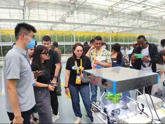 Foreign journalists covering the China-Central Asia Summit visit Yangling Agricultural Hi-tech Industrial Demonstration Zone in northwest China's Shaanxi province, May 20, 2023. (Photo by Xing Bo)