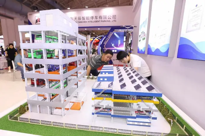 A model of a three-dimensional parking lot for buses is exhibited at the China International Urban Parking Industry Expo held in Beijing, May 31, 2023. (Photo by Chen Xiaogen/People's Daily Online)