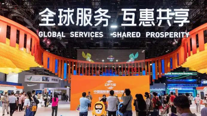 Visitors tour an exhibition area of the 2022 China International Fair for Trade in Services (CIFTIS) at the China National Convention Center in Beijing, on Sept. 3, 2022. (Photo by Zhang Ruxun/People's Daily Online)