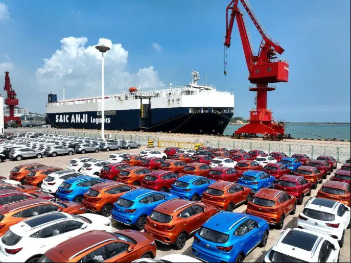 A ro-ro ship docks at a terminal of the Lianyungang port in east China's Jiangsu province to load vehicles to be exported, Aug. 20, 2023. (Photo by Wang Chun/People's Daily Online)