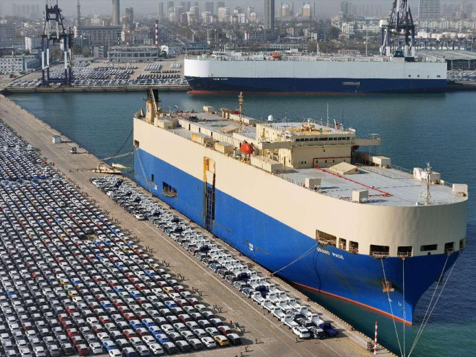 China-manufactured vehicles are about to be shipped overseas at the Yantai port, east China's Shandong province. (Photo by Tang Ke/People's Daily Online)