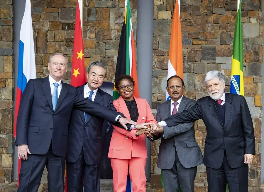 Wang Yi (2nd L), a member of the Political Bureau of the Communist Party of China (CPC) Central Committee and director of the Office of the CPC Central Commission for Foreign Affairs, poses for a group photo with Khumbudzo Ntshavheni (C), minister in the Presidency of South Africa, Celso Luiz Nunes Amorim (1st R), chief adviser of the Presidency of Brazil, Nikolai Patrushev (1st L), secretary of the Security Council of Russia, and National Security Adviser of India Ajit Doval (2nd R) at the 13th Meeting of BRICS National Security Advisers and High Representatives on National Security in Johannesburg, South Africa, July 25, 2023. (Xinhua/Zhang Yudong)