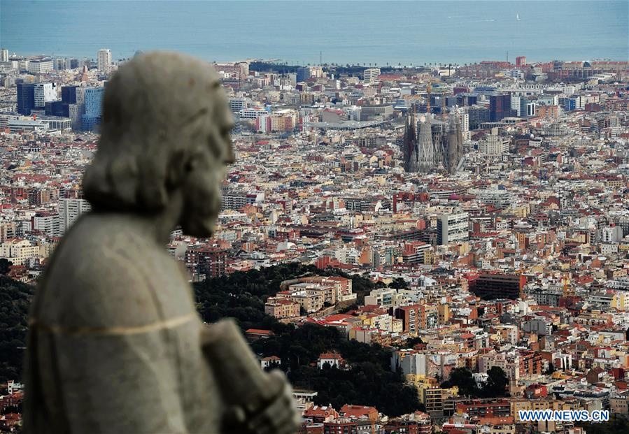 Photo taken from Tibidabo Peak shows the city view of Barcelona, Spain. (Xinhua/Guo Qiuda)