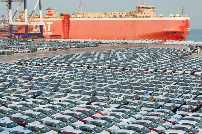 Chinese-made vehicles are ready for shipment and export at Yantai Port in east China's Shandong province, on Jan. 8, 2024. (Photo by Tang Ke/People's Daily Online)