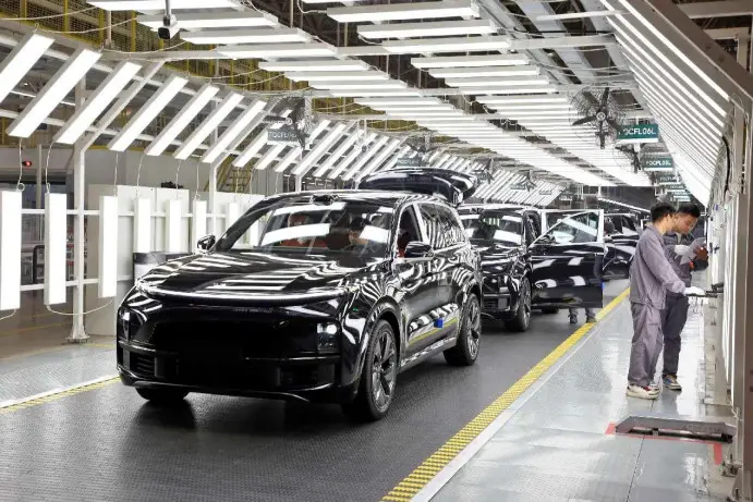 New energy vehicles go through quality check at a production base of Chinese carmaker Li Auto in Changzhou, east China's Jiangsu province. (Photo by Chen Wei/People's Daily Online)