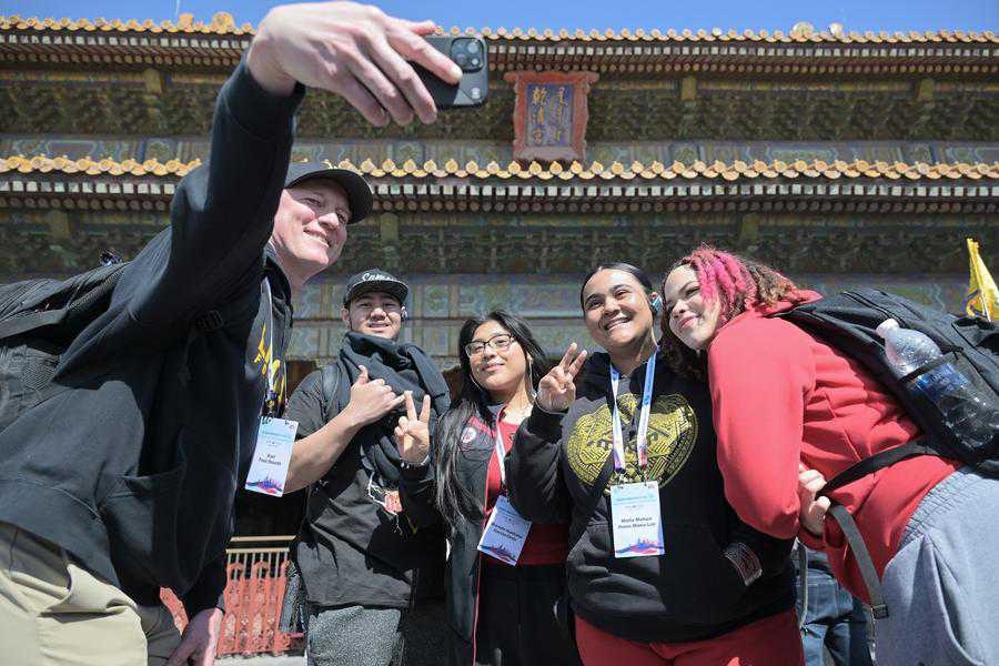 Members of a delegation of high school students from the U.S. state of Washington pose for a photo in front of the Qianqing Gong, or the Palace of Heavenly Purity, at the Palace Museum in Beijing, capital of China, March 19, 2024. (Xinhua/Li Xin) Members of a delegation of high school students from the U.S. state of Washington pose for a photo in front of the Qianqing Gong, or the Palace of Heavenly Purity, at the Palace Museum in Beijing, capital of China, March 19, 2024. (Xinhua/Li Xin)