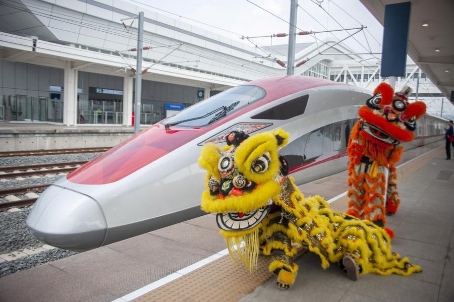 Lion dance performers pose for photos with a high-speed electrical multiple unit (EMU) train on the platform at the Jakarta-Bandung High-Speed Railway's Padalarang Station in Padalarang, Indonesia, Feb. 10, 2024. (Photo by Septianjar Muharam/Xinhua) Lion dance performers pose for photos with a high-speed electrical multiple unit (EMU) train on the platform at the Jakarta-Bandung High-Speed Railway's Padalarang Station in Padalarang, Indonesia, Feb. 10, 2024. (Photo by Septianjar Muharam/Xinhua)