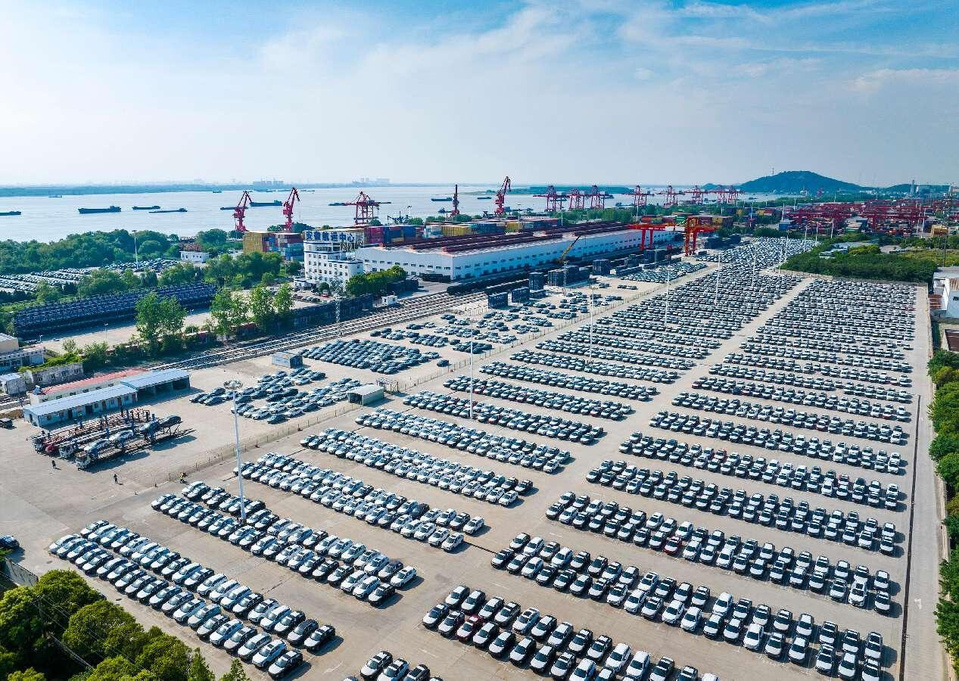 Automobiles awake export at a terminal in Wuhu, east China's Anhui province, May 14, 2025. (Photo by Xiao Benxiang/People's Daily Online)