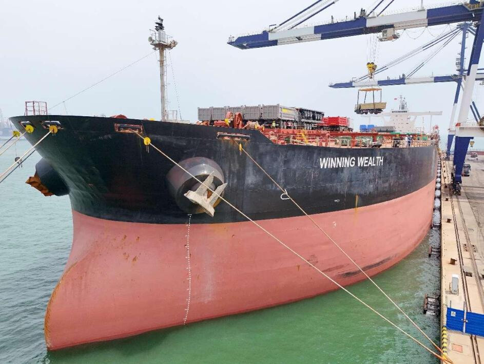 Chinese-made trucks are loaded onto a cargo ship in Yantai, east China's Shandong province, ready to be exported to Africa, May 14, 2025. (Photo by Tang Ke/People's Daily Online)