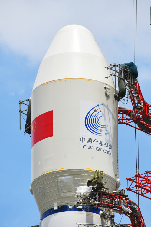 Photo shows the fairing of the Long March-3B rocket with a logo of China's planetary exploration. (Photo by Zhang Man)