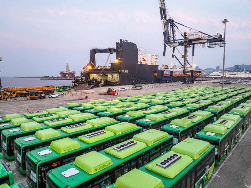 New energy buses are loaded onto a ship at Yantai Port, east China's Shandong province, for export to Pakistan, Aug. 14, 2025. (Photo/Zhang Chao) New energy buses are loaded onto a ship at Yantai Port, east China's Shandong province, for export to Pakistan, Aug. 14, 2025. (Photo/Zhang Chao)