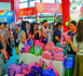 Visitors to the 22nd China-ASEAN Expo buy Thai products, Sept. 18, 2025. (Photo/Zhu Xiaoming)