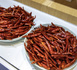 Shanghai, Nov.10, 2022 – Distinctive African agricultural products, such as Rwandan dried chili peppers, are showcased at the International Trade Centre booth during the 5th CIIE. [Photo: CFP]