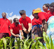 A Chinese expert of a Science and Technology Backyard in Malawi discusses corn maize yield-improvement techniques with local students. (Photo provided by China Agricultural University)