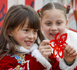 Foreign children experience paper cutting, an intangible cultural heritage item, in Nanxinan village, Huangshan, east China's Anhui province. (Photo/Shi Yalei)
