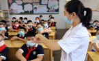 Chinese students return to school as new semester kicks off
