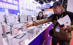 Why does China, a developing country, remain committed to carbon reduction?